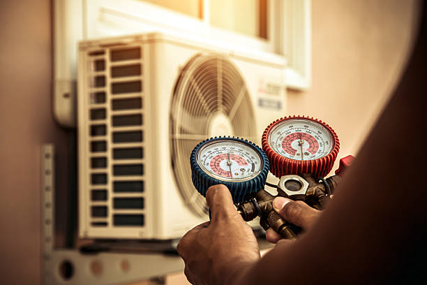 Professional Air Conditioning Service technician working in Lewiston, UT
